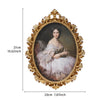 An oval framed painting featuring a woman in period attire with an ornate gold resin wall decor frame.
