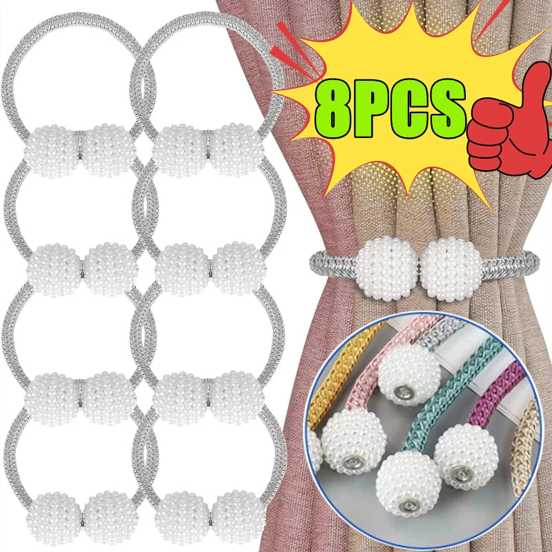 Set of eight pearl magnetic curtain tie-back clips displayed against a pink fabric background.