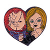 Enamel pin featuring Chucky the doll with red hair and a stitched face.