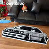 A cozy cartoon print plush carpet featuring a stylized orange animal on a black background.