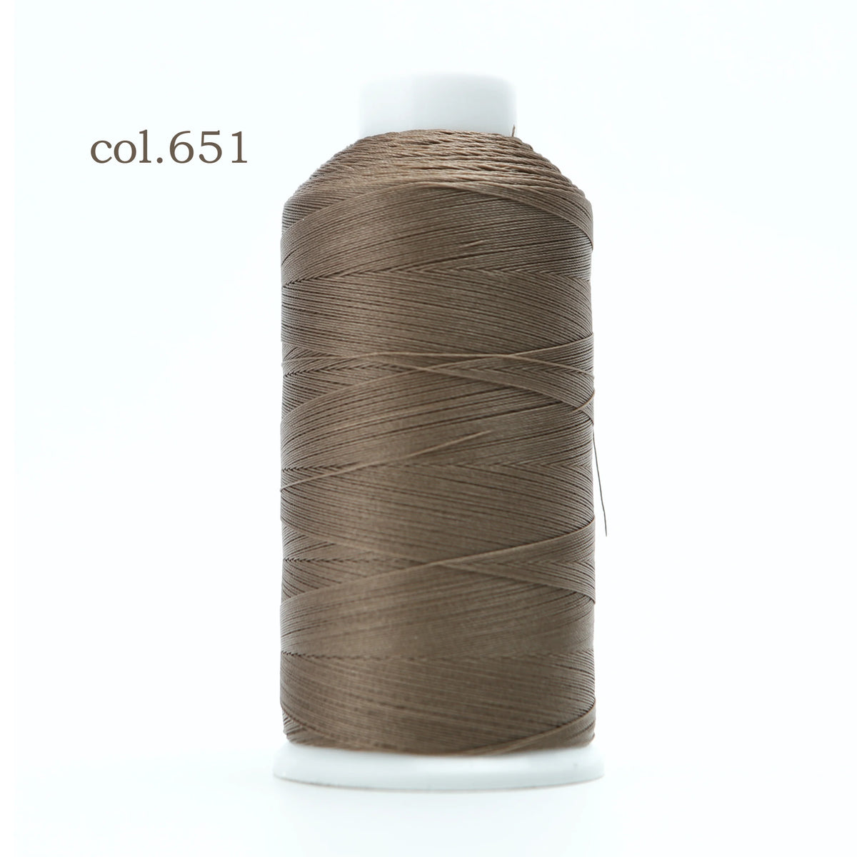 Spool of col.651 heavy-duty nylon bonded thread for leather, upholstery, and canvas.
