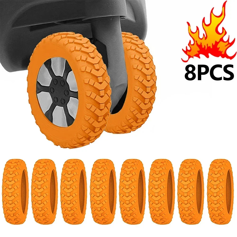 Eight silicone luggage wheel protectors in orange color shown next to a black component.