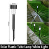 A vertical view of a black solar plastic tube lamp used for garden path lighting.