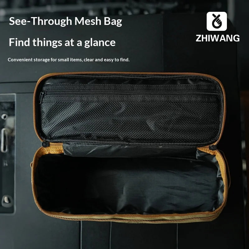 A black see-through mesh storage bag with an open compartment showing a padded inner section.