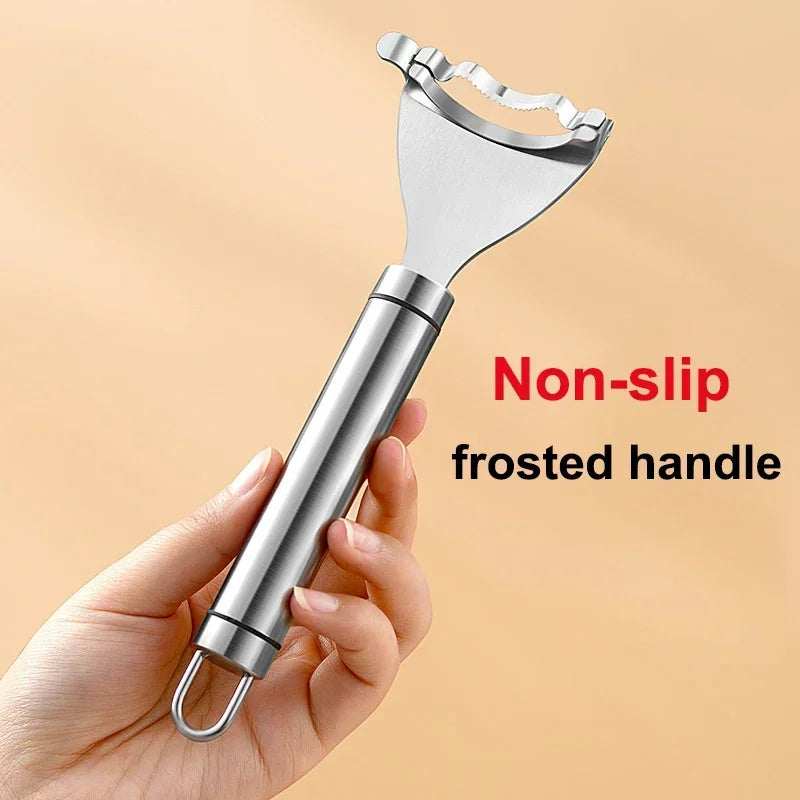 A hand is holding a stainless steel corn peeler with a frosted, non-slip handle.