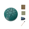 A teal steel tongue drum with six numbered holes and accompanying accessories for meditation.