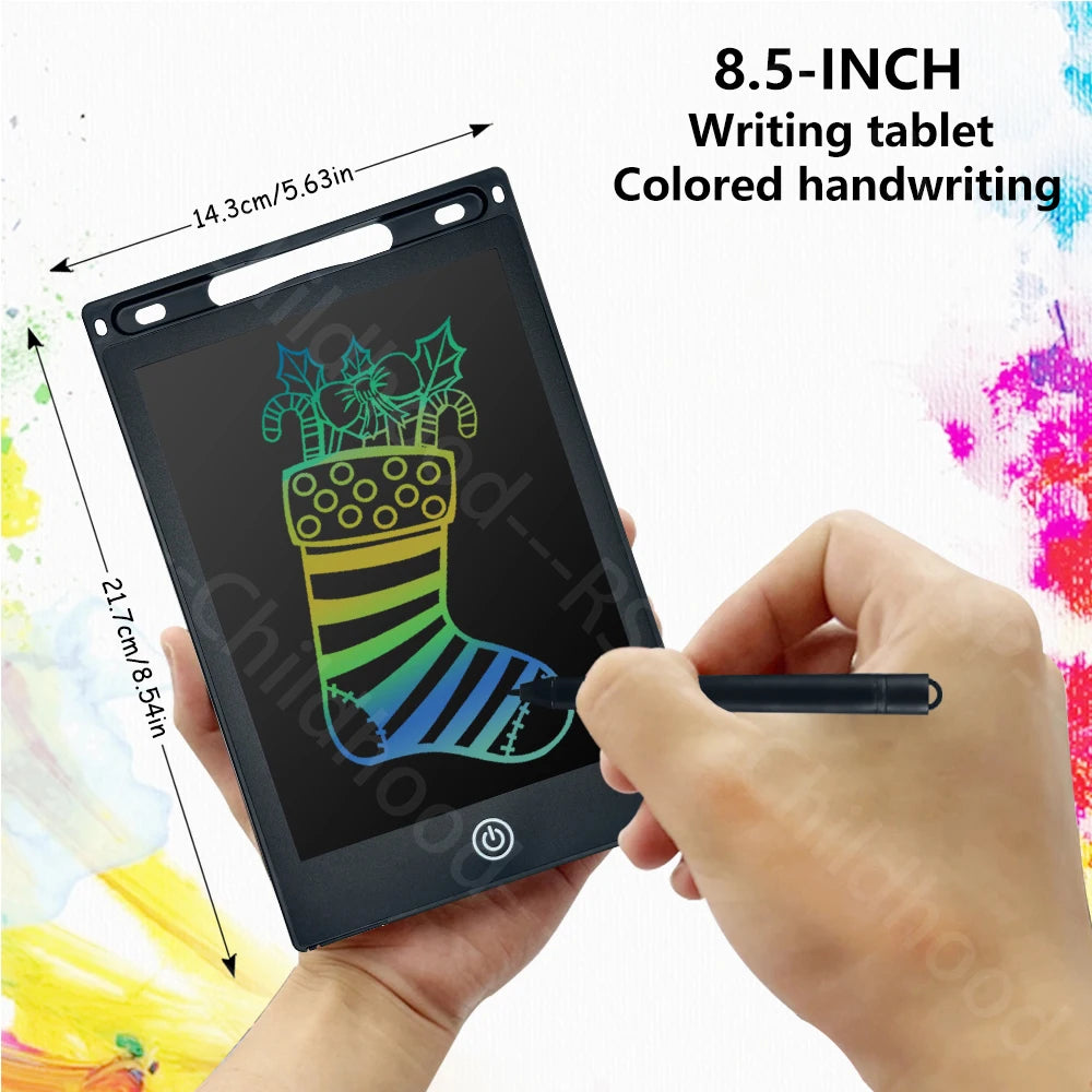 An 8.5-inch LCD writing tablet showing a colorful drawing of a Christmas stocking and tree, held by a hand.