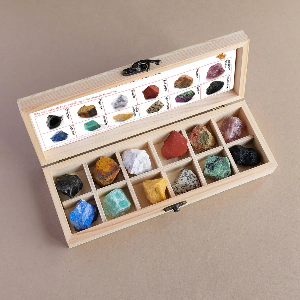 A wooden gift box containing twelve natural amethyst crystal stones arranged in compartments.