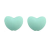 A pair of light mint green silicone heart beads for DIY jewelry making