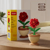 A set of 99 rose flower building blocks in red and green colors displayed next to the packaging.
