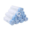 Rolls of white and light blue scented drawstring trash bags with handles