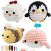 A set of four crocheted animal figures including a white chick, a black penguin, a yellow bear, and a pink octopus.