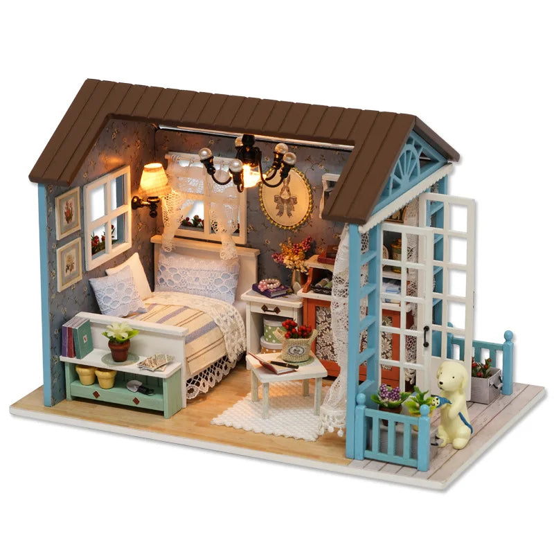 A wooden miniature dollhouse kit featuring a bedroom with furniture and decorative elements.