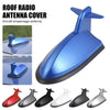A collection of various aerodynamic antenna covers and boosters in red, black, silver, and white finishes.