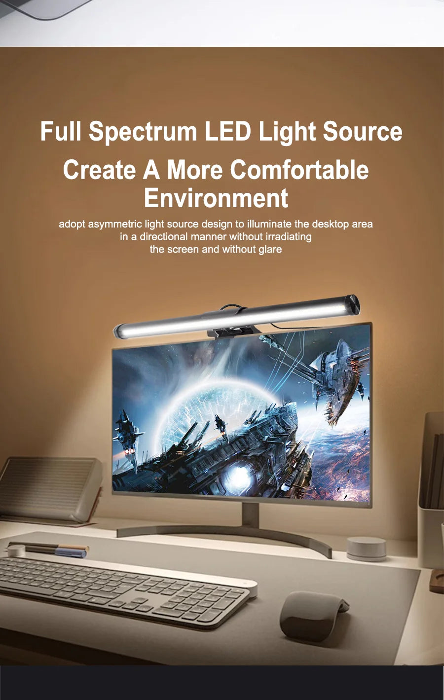 A silver LED light bar illuminates a computer monitor in a dark office setting.