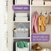 A storage organizer with multiple compartments for diapers and baby items, featuring canvas and fabric storage.