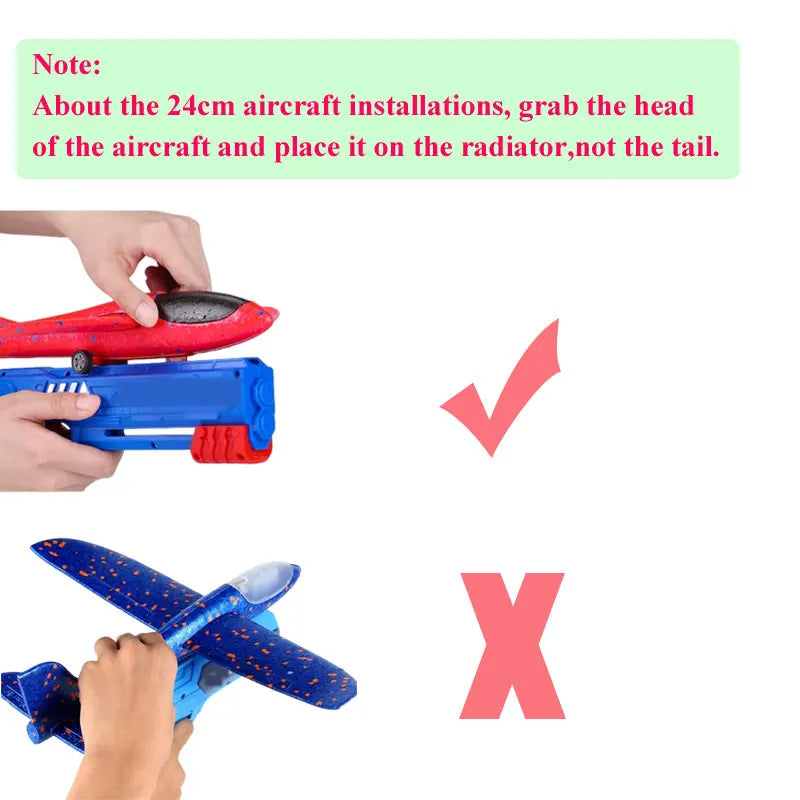 A hand is placing a red foam airplane head onto a radiator, demonstrating correct installation for an outdoor toy.