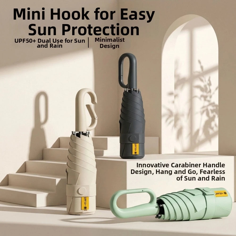 A mini hook designed for easy sun protection, shown next to a compact folding umbrella.