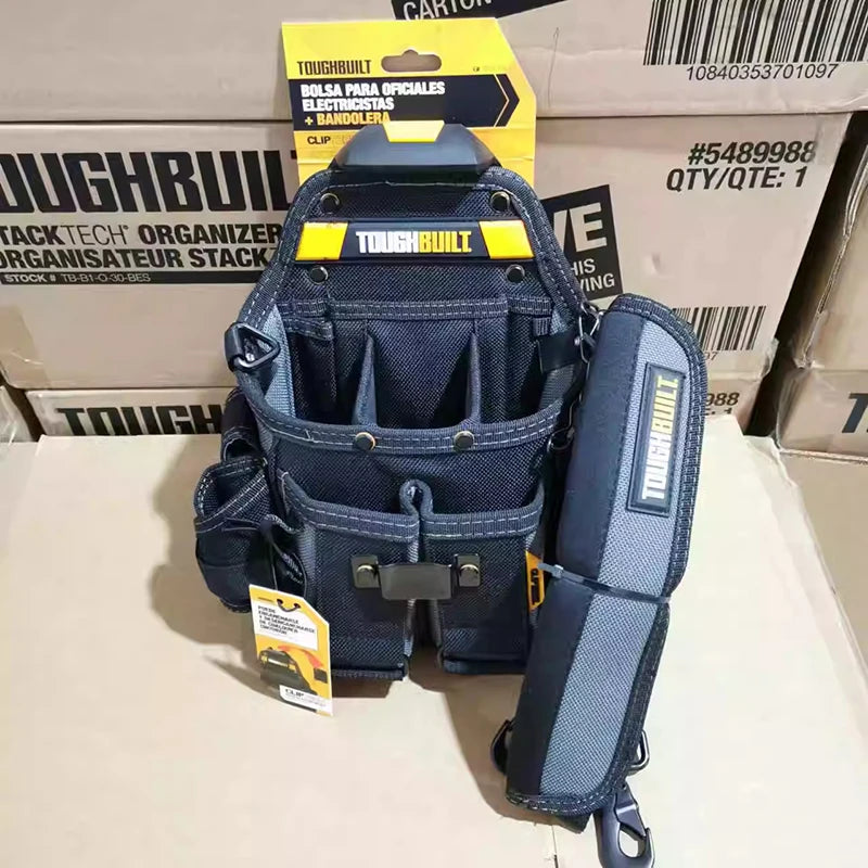 A dark blue electrician tool pouch with a belt clip and kickstand is shown in a cardboard box.