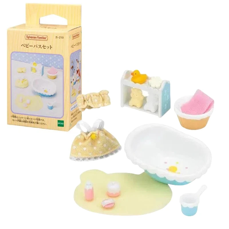 A boxed set of Sylvanian Families Forest Friends baby accessories including food items and a small wooden shelf.