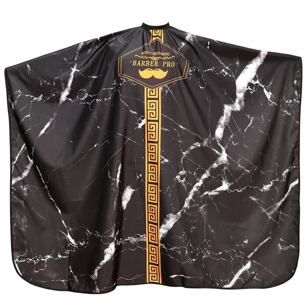 Black waterproof barber gown or cape with gold trim and a decorative label
