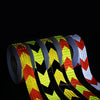 Rolls of high-visibility reflective safety tape for vehicles in various colors and patterns