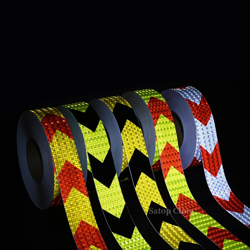 Rolls of high-visibility reflective safety tape for vehicles in various colors and patterns