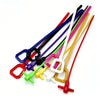 A collection of five colorful replacement ripcord rulers for launcher toys, featuring various colored plastic handles.