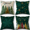 A set of four vintage fall pumpkin pillow covers featuring winter and Christmas holiday designs on dark green fabric.