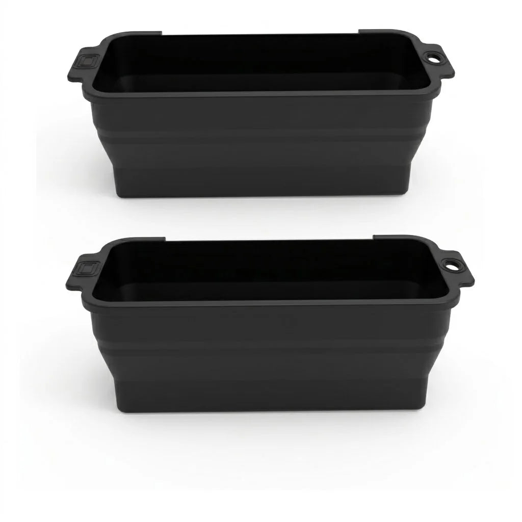 Two black reusable silicone grease liners for griddle pans shown side by side.