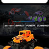Orange off-road stunt car with large tires and black chassis shown in a dynamic driving pose.