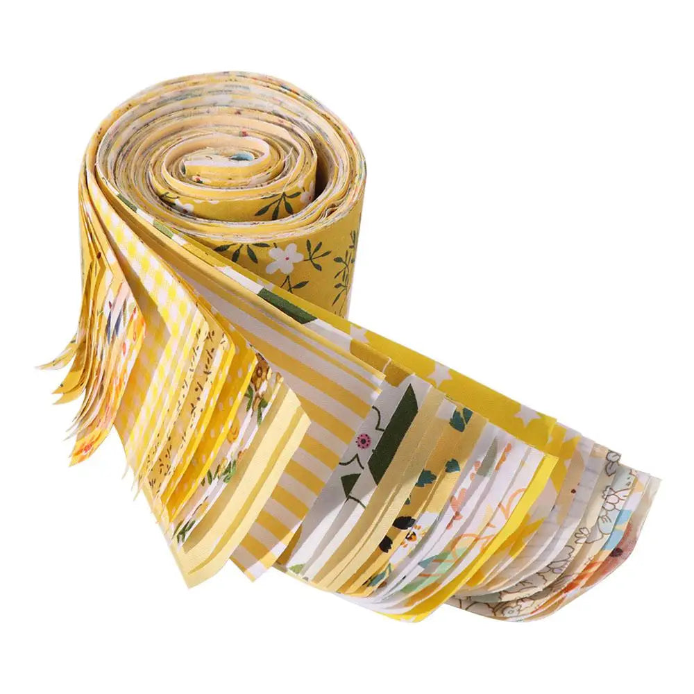 Roll of yellow and white floral cotton fabric strips for quilting and patchwork