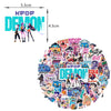 A collection of KPOP Demon themed birthday party decorations including figures and props.