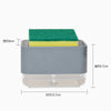 A gray kitchen soap dispenser with a clear base and a green sponge holder.