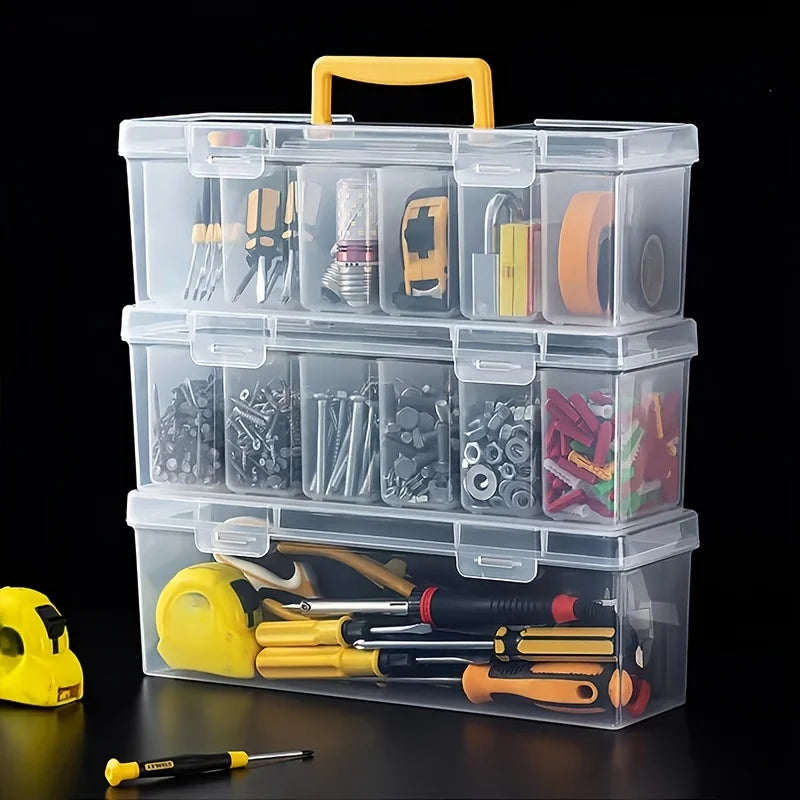 A clear plastic storage box with multiple compartments holds various tools and hardware items.
