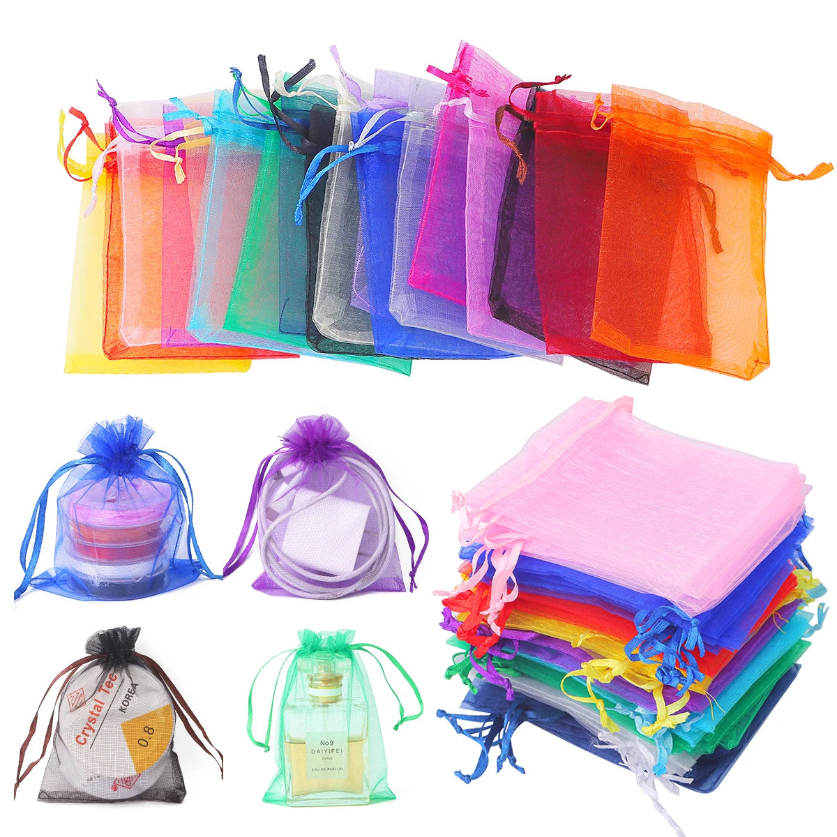 Assorted organza drawstring gift bags in various colors and textures stacked and laid out.