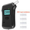 Black portable digital breathalyzer device with an LCD display and four spare mouthpieces
