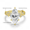 A gold ring featuring a marquise cut moissanite stone set in 925 silver and 14k gold filled metal.