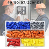 A collection of color-coded twist-on wire connectors in various sizes and colors, including blue, black, orange, and yellow.