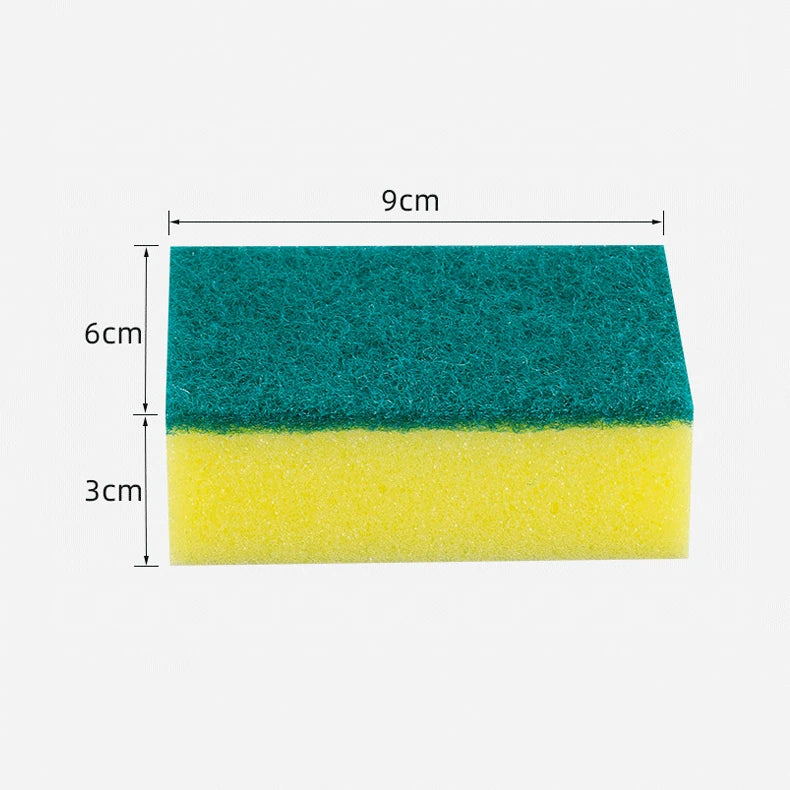 A rectangular scouring pad showing a green foam layer on top and a yellow foam layer underneath.