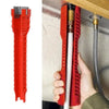 A red multifunctional faucet and sink wrench set is shown next to a hand holding the tools above a sink.