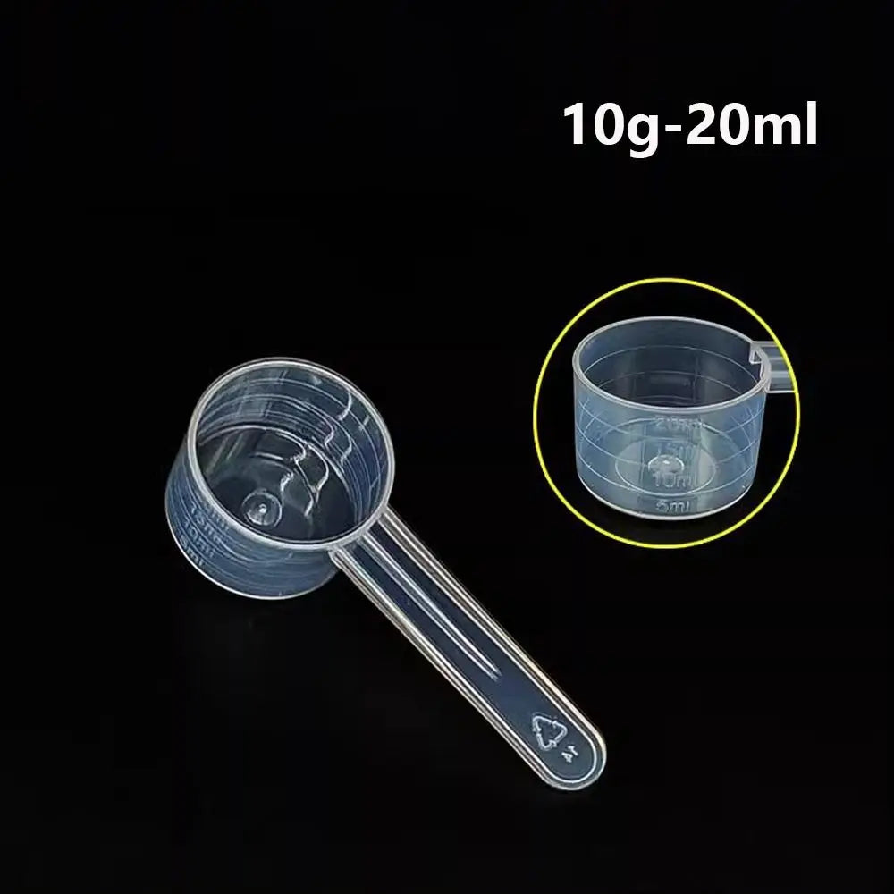 A clear plastic measuring cup with a long spout is shown next to a circular inset indicating volume measurements.