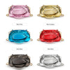 A display of six mini metal clutch bags in various colors: pink, gold, blue, red, black, and silver.