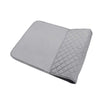 A gray heat-resistant portable ironing mat with a quilted section.