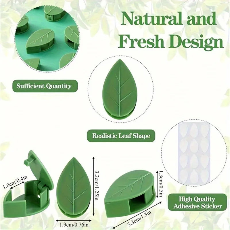 Green adhesive clips shaped like leaves used to attach climbing vines or plants