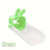 A green rabbit-themed anti-splash faucet extender for kids, shown in a white plastic design.