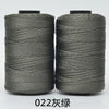 Two spools of dark gray 3-ply polyester knitting yarn for crochet and hand crafts