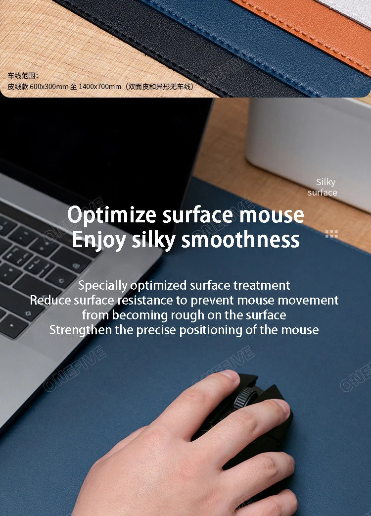 A hand is using a black mouse on a blue desk mat, highlighting silky smooth surface movement.
