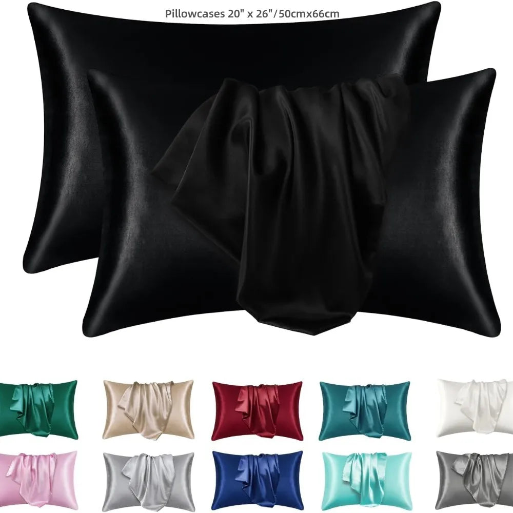 Un juego de fundas de almohada de seda satinada negras en varios colores, incluyendo verde, beige, rojo, azul y blanco.