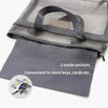 Gray mesh hanging toiletry bag with an attached pocket and a separate gray fabric pouch.